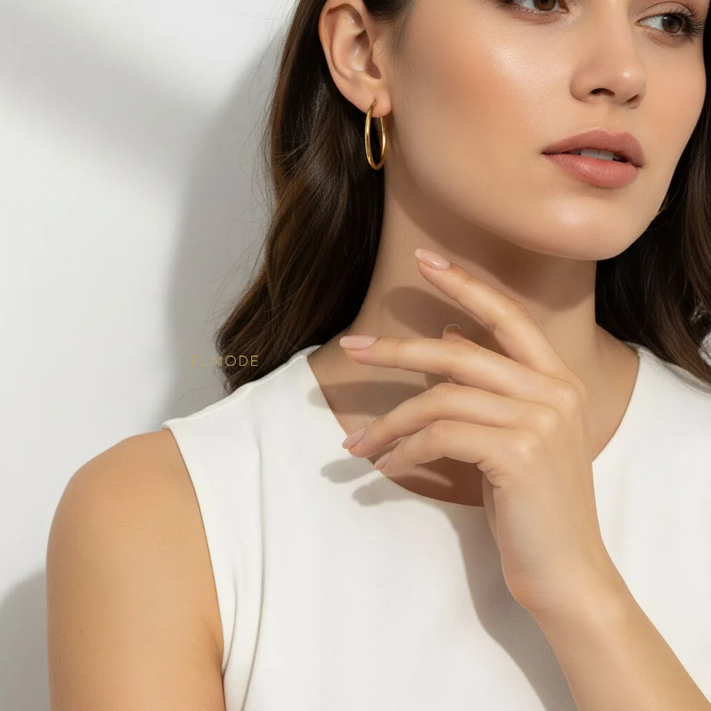 گوشواره حلقه‌ای زنانه استیل طلایی مدل ELM-8270 برند Steel